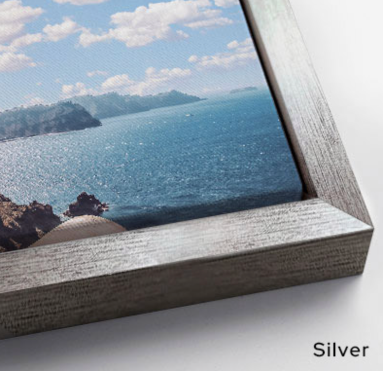 Close up texture detail of a premium gallery wrapped silver framed canvas print showing high-quality abstract brushstrokes