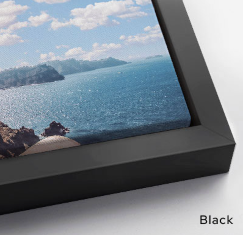 Close up texture detail of a premium gallery wrapped black floating framed canvas print showing high-quality abstract brushstrokes